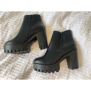 Brand new Women’s black heeled boots/booties